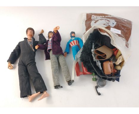A CHILDHOOD TOY FAVOURITE! A VINTAGE STANDARD ACTION MAN with a bag of assorted clothing and equipment. Together with a DR. W