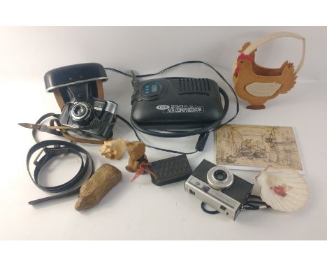 A small mixed lot to include a 12V x 250 PSI Air Compressor with lead for plugging into car cigarette lighter, a REVUE 250BS 