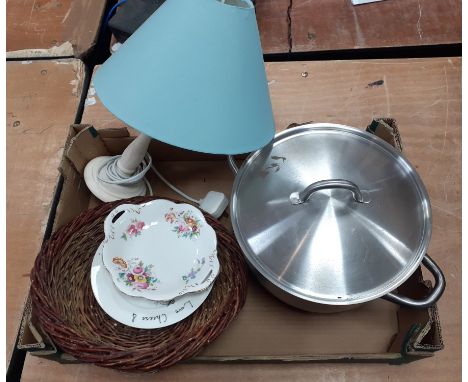 A mixed box to include a table lamp with blue shade, large aluminium soup pot and a shallow wicker basket