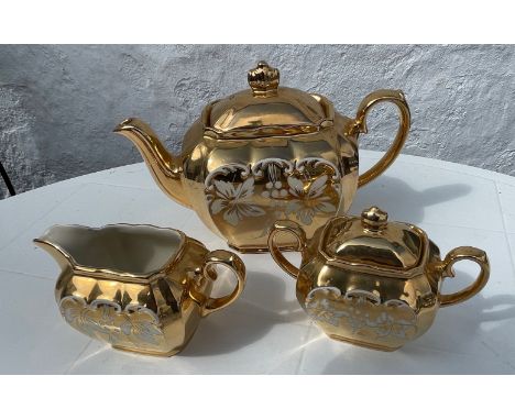 A vintage SADLER gilt tea service comprising teapot, milk jug and sugar bowl,Approx 3 pieces