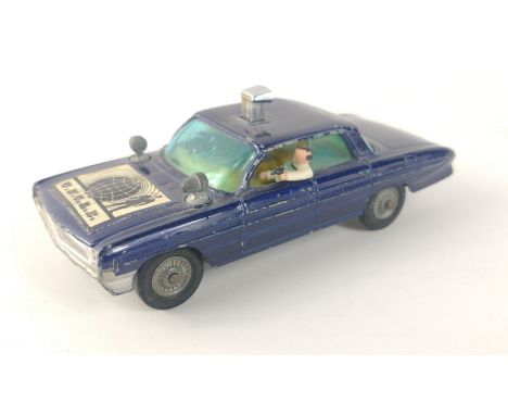 A CORGI toys MAN FROM U.N.C.L.E. Oldsmobile super 88 diecast model in good condition, light play wear, good working actionApp