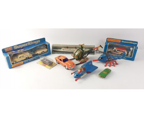 CARS AND BOATS AND HELICOPTERS! A VINTAGE collection of MATCHBOX, CORGI model transporters to include a Matchbox K-68 Dodge M