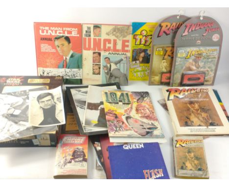 An assorted lot of movie and TV ephemera to include Raiders of the Lost Ark illustrated screenplay, Star Wars Episode I movie