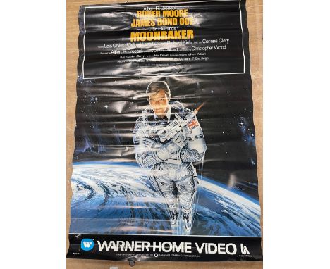 ROGER MOORE as JAMES BOND in MOONRAKER Warner Communications Company Warner Home Video Copyright 1983 wall poster in good con