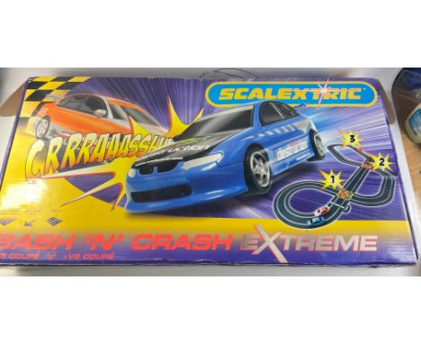 SCALEXTRIC BASH 'N CRASH racing car set.  Boxed used set in great condition.  Contains both V8 Coupes and comes with track, p