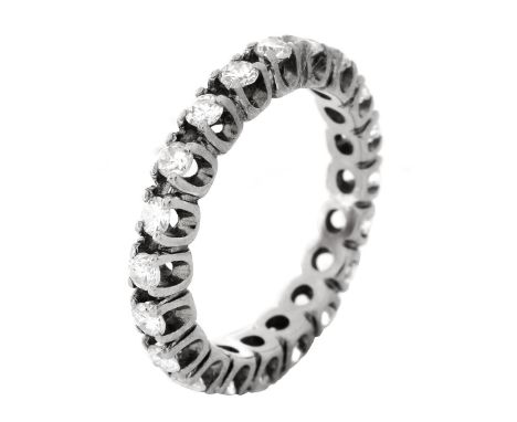 Vintage Approx. 1.0 Carat Round Brilliant Cut Diamond and 14 Karat White Gold Eternity Band. Diamonds H color, SI1 clarity. U