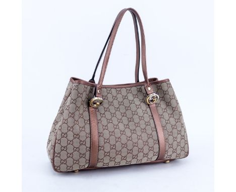 Gucci Beige/Metallic Brown And Leather Monogram Canvas Twins PM Tote. Gold and silver tone hardware. Signature fabric interio