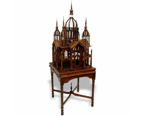 Victorian Style Architectural Cathedral Hand Carved Mahogany Birdcage. Composed of two parts, large center dome flanked by fo