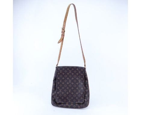Louis Vuitton Monogram Canvas Musette Shoulder/Crossbody Bag. Golden brass hardware. Canvas and leather interior with one poc