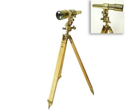 Antique Parisian Brass Telescope on Gaumont Paris Tripod Stand. Telescope is marked "Evachete Paris" and numbered, makers mar