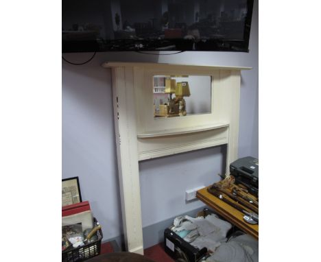 An Early XX Century White Painted Fireplace, with a central rectangular shaped mirror, over a bow fronted shelf, on square su