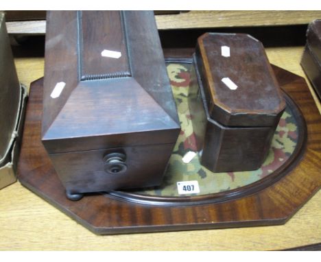 A XIX Century Rosewood Sarcophagus Shaped Tea Caddy, together with a mahogany framed wool work panel and a late XVIII Century