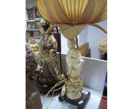 An Early XX Century Japanese Pottery Table Lamp, as a Geisha, a carved hardwood stand, another white pottery example with lot