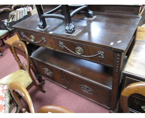 An Early XX Century Mahogany Buffet, with a low back with turned finial's, two small drawers, pen shelf, over cupboard doors,