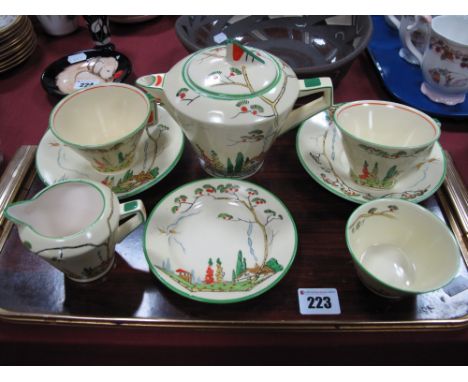 A 1930's Art Deco Pottery Tea-For-Two Set, (possibly Grimwades) painted and printed with a cottage garden with hollyhocks, co