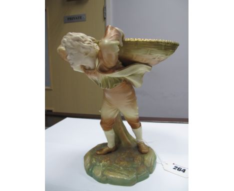 A Royal Worcester "Hadley" Sweetmeat Dish, modelled in the form of a boy carrying a large basket upon a rocky green, the base
