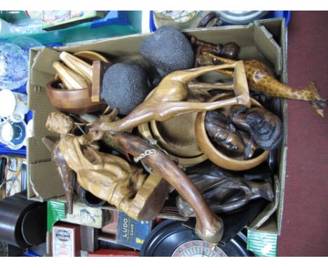 Two Carved African Heads, wooden bowls, carved figure of a man playing a musical instrument, etc:- One Box