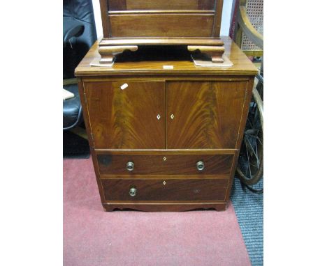 A XIX Century Mahogany Commode, with two cupboard doors over dummy drawers, on bracket feet.