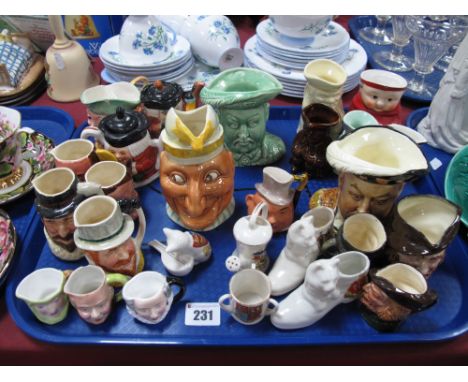 A Collection of Character Jugs, including Sylvac Mr Punch and Henry VIII, Royal Doulton Robin Hood (small and medium) and Mic