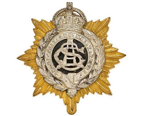 Army Service Corps Officer’s cap badge circa 1901-17.Die-cast gilt star mounted with silvered crowned Garter within laurel sp