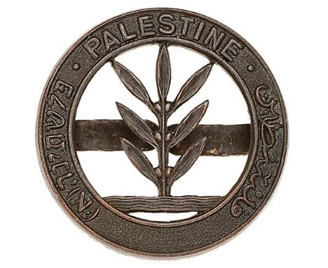 Palestine Regiment OSD cap badge circa 1942-48.Die-cast bronze Olive tree within a circlet inscribed “Palestine” in English, 