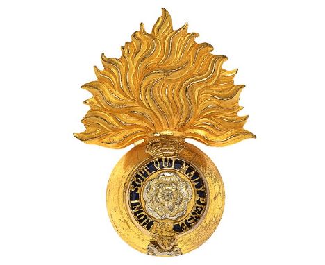 Royal Fusiliers (City of London Regiment) Officer’s pre 1952  cap badge.Fine gilt flaming grenade mounted with crowned pierce