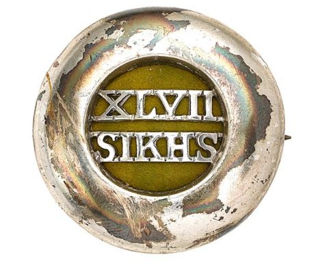 Indian Army. 47th Sikhs Officer’s pagri badge circa 1903-22.Good dished hollow silvered quoit with “XLVII / SIKHS” to the yel