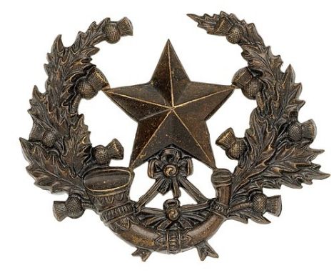 Cameronians (Scottish Rifles) Victorian OR's glengarry badge.Die-stamped blackened brass Mullet on strung bugle within thistl
