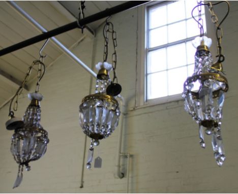 Three small cut glass light fittings