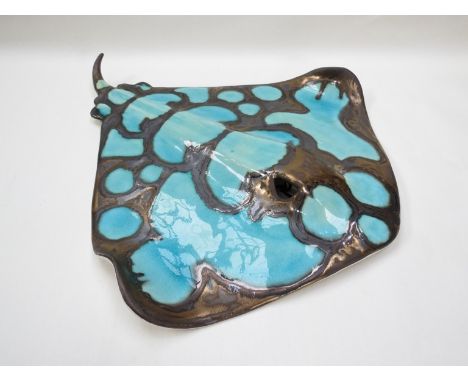 A studio ceramic sting ray with bronze lustre and turquoise glazes, incised CMB monogram, 44cm