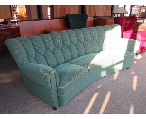 A green Damask 1940's curved Danish sofa 