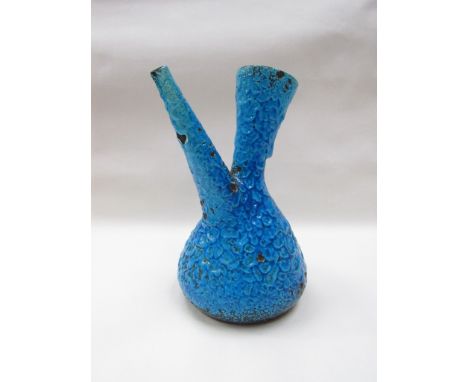 A Continental ceramic ewer with blue lava glaze, unmarked, 23cm tall 
