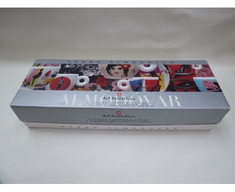 A boxed set of Pedro Almodorar cups and saucers, Ivy collection with printed designs 