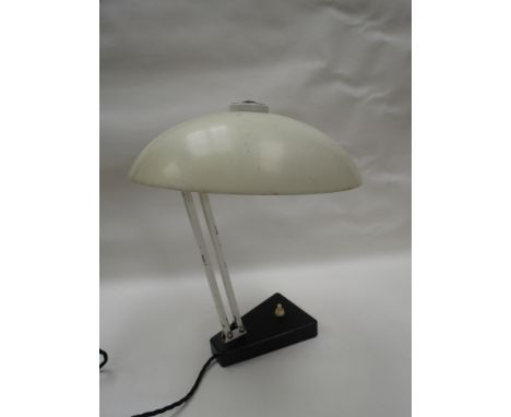 A white and black adjustable desk lamp, saucer shade 