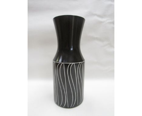 A Hornsea pottery Tanglewood vase with green/slate coloured glaze and incised wave line detail No 186 by John Clappison 29.5c