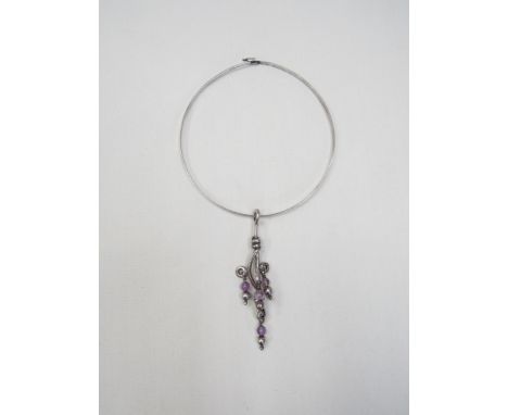 A 1970's Israel silver torc choker necklace with large abstract pendant with amethyst ball drops 