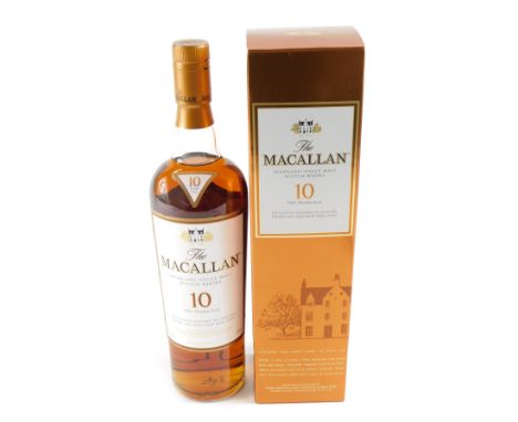 A bottle of The Macallan Highland single malt Scotch whisky, aged ten years.