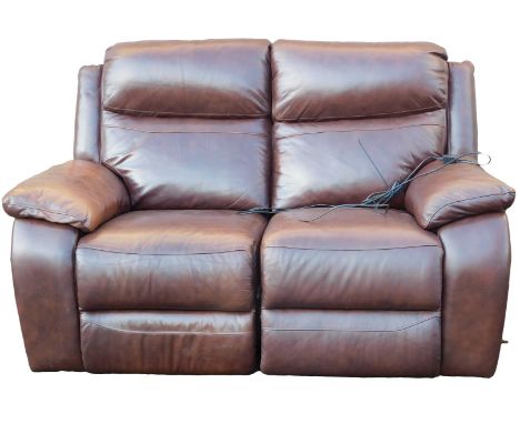 An electric reclining two seat brown leather sofa, with transformer. 