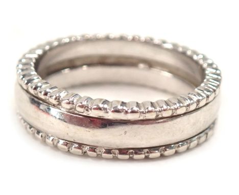 A 9ct white gold wedding band, with a beaded border, ring size Q, 7.6g all in.