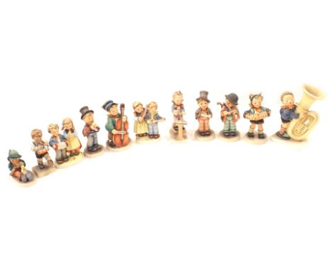 A group of Goebel Hummel figures, to include musicians, children playing, etc. (11) 