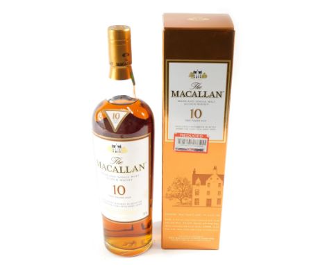 A bottle of the Macallan Highland single malt scotch whisky, aged ten years, boxed. 
