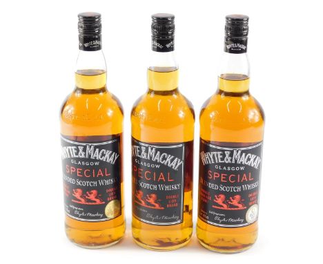 Three bottles of Whyte and Mackay Glasgow special blended scotch whisky, 1ltr. 