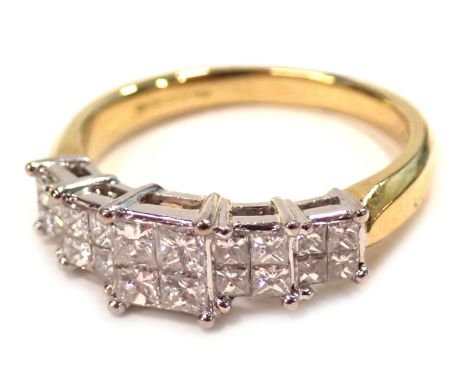 An 18ct gold diamond dress ring, with five square diamond sections, each with four square cut stones totalling 1ct overall, i