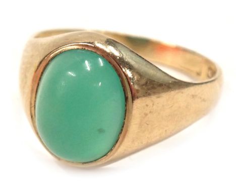 A 9ct gold signet ring, with a polished cabachon pale green stone, ring size L, 2.6g all in. 