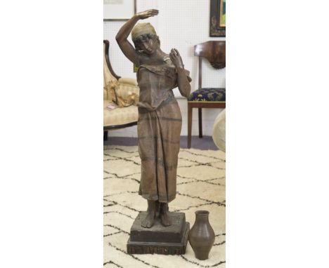 STUDIO OF GOLDSCHEIDER, porteuse d'eau Épreuve en terre cuite polychrome finished clay, 118cm H. (with faults, amphora loose)