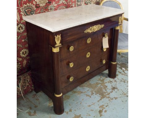 COMMODE, early 19th century French Empire flame mahogany and gilt metal mounted with four long drawers, pillars and white mar