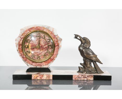 ART DECO FRENCH MIXED MARBLE MANTEL CLOCK
unsigned keyless wind movement, the marble dial with stylised Arabic numeral gilt c