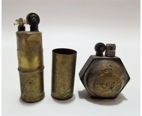 Two WWI trench lighters, one of hexagonal section with Royal Army Service Corps George VI brass applied buttons, the other of