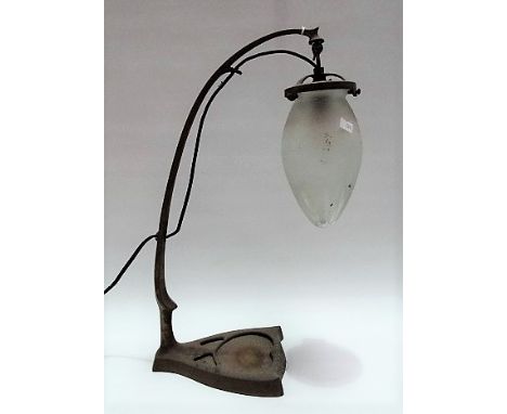 Early 20th Century Secessionist brass table lamp on cantilever support with frosted and star cut glass shade, height 44cm (co