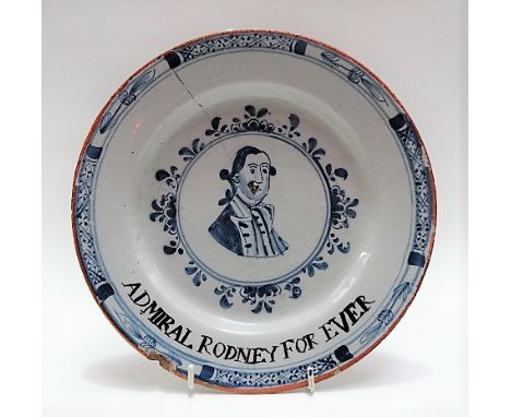 Of naval interest - 18th Century English Delft blue and white plate, the centre decorated with a bust portrait of an officer 